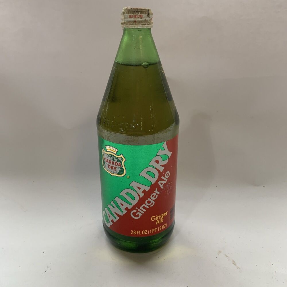Vintage Full Bottle Canada dry Gingerale 28 fluid ounces